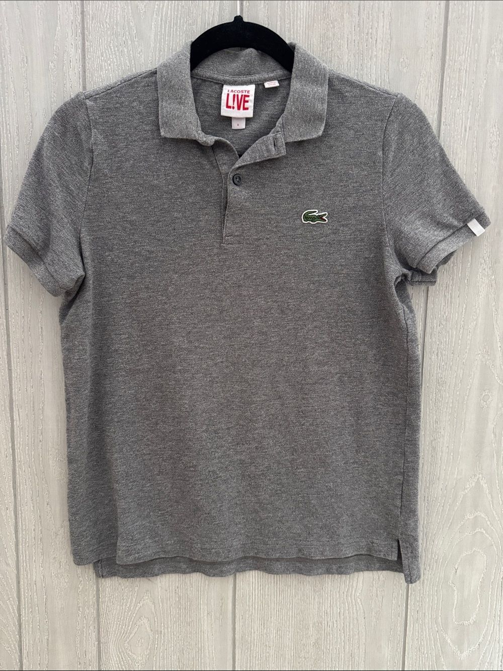 Small gray Lacoste polo with logo